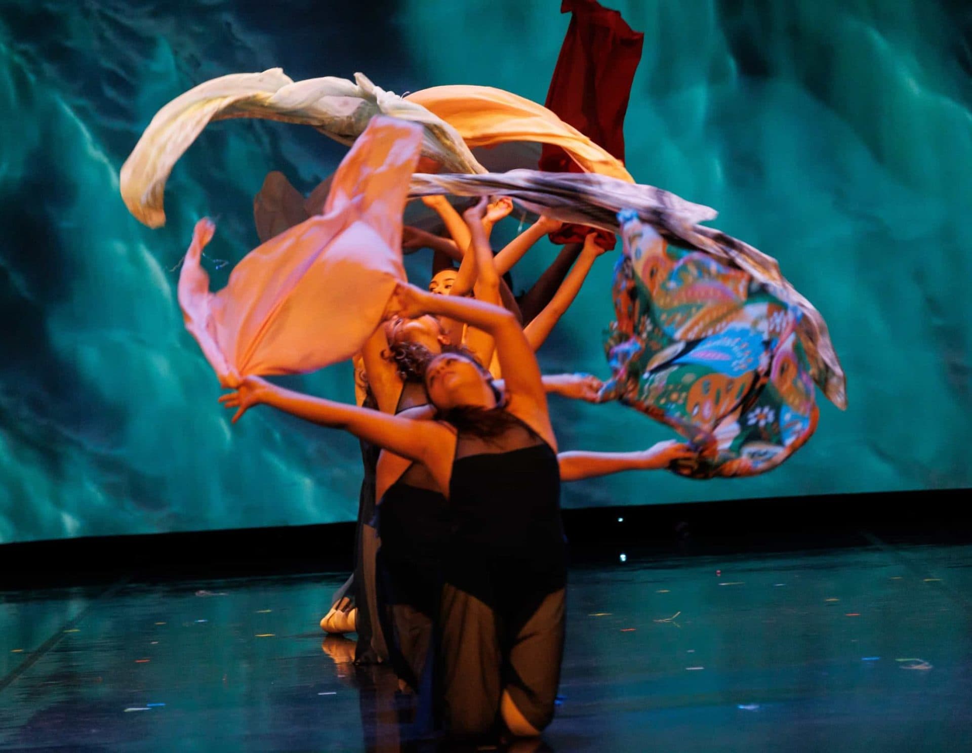 advanced contemporary dance group with scarves